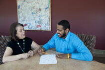 Male researcher working with a female participant